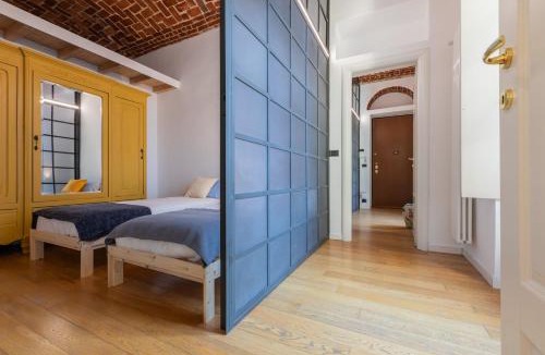 Cit Turin Apartment | Charming Colorful Brick by Wonderful Italy