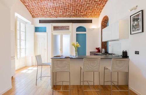 Cit Turin Apartment | Charming Colorful Brick by Wonderful Italy