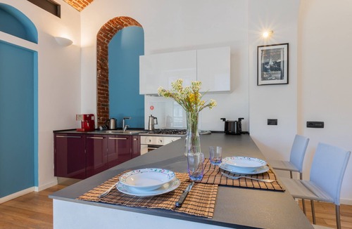 Cit Turin Apartment | Charming Colorful Brick by Wonderful Italy