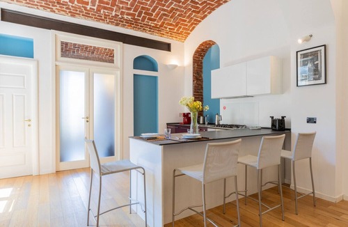 Cit Turin Apartment | Charming Colorful Brick by Wonderful Italy