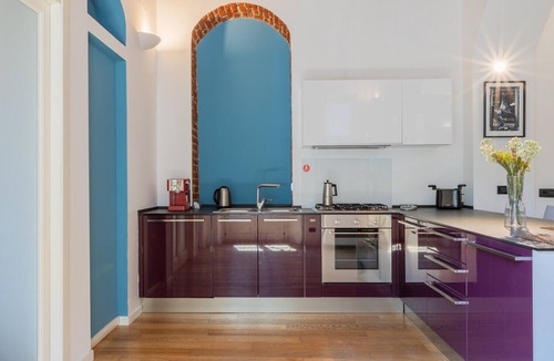 Cit Turin Apartment | Charming Colorful Brick by Wonderful Italy