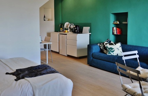 Citta della Pieve Apartment | Contemporary decor in a Medieval townhouse: studio suite with Umbrian hill views