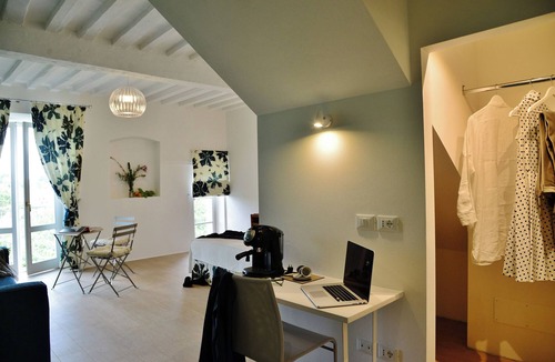 Citta della Pieve Apartment | Contemporary decor in a Medieval townhouse: studio suite with Umbrian hill views