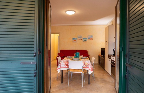 Tortoreto Lido Apartment | Cosy apartment for 4 people with A/C, pool, WIFI, TV, patio and pets allowed