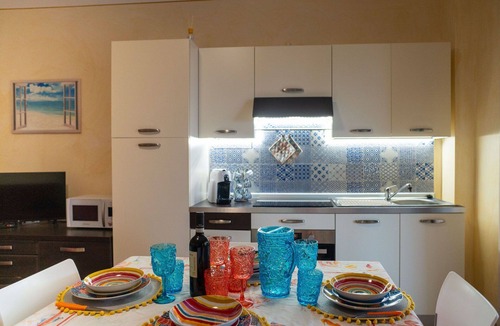 Tortoreto Lido Apartment | Cosy apartment for 4 people with A/C, pool, WIFI, TV, patio and pets allowed