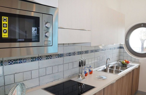 Terracina Apartment | Cosy apartment for 8 people with WIFI, pool, A/C, TV, balcony and pets allowed