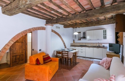 Castelnuovo di Val di Cecina Villa | Cosy apartment in villa for 4 people with pool, WIFI, TV, patio and pets allowed