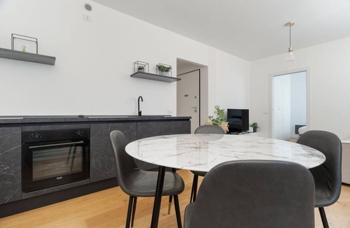 Milan Apartment | Cozy 41m2 apartment, ideal for 4 people, located in the basement (stairs to access).The accommodation is located in the Harar district, an architectural project designed to respond to post-war housing needs, structured around large green areas and thanks