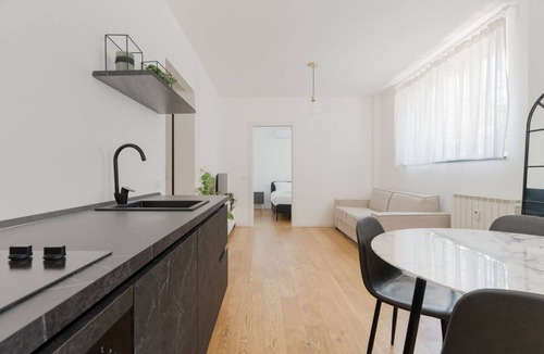 Milan Apartment | Cozy 41m2 apartment, ideal for 4 people, located in the basement (stairs to access).The accommodation is located in the Harar district, an architectural project designed to respond to post-war housing needs, structured around large green areas and thanks