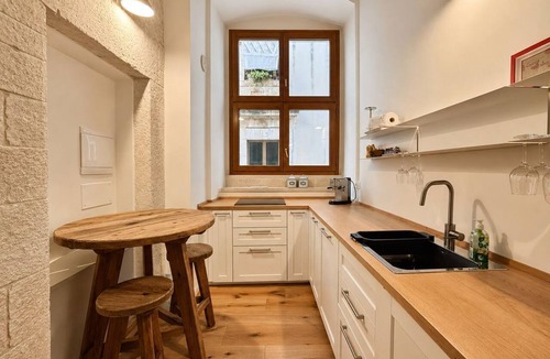 Giovinazzo Apartment | Cozy 60sqm flat with a mezzanine, ideal for 4 people, located on the first floor of a prestigious building (without elevator).The property is situated in Giovinazzo, in the historic center, just steps from the sea.Characterized by narrow alleys, 15th-cen
