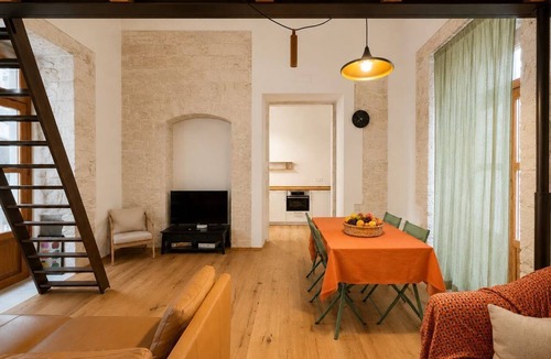 Giovinazzo Apartment | Cozy 60sqm flat with a mezzanine, ideal for 4 people, located on the first floor of a prestigious building (without elevator).The property is situated in Giovinazzo, in the historic center, just steps from the sea.Characterized by narrow alleys, 15th-cen