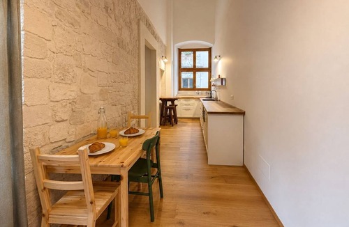 Giovinazzo Apartment | Cozy 60sqm flat with a mezzanine, ideal for 4 people, located on the first floor of a prestigious building (without elevator).The property is situated in Giovinazzo, in the historic center, just steps from the sea.Characterized by narrow alleys, 15th-cen