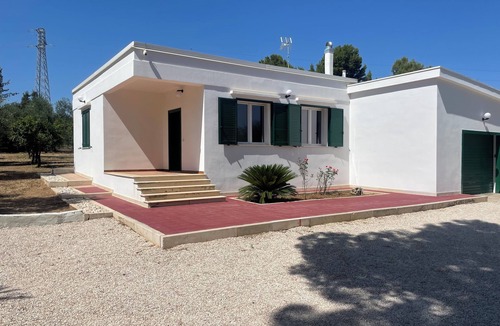 Trani Villa | Cozy guest house on private olive orchard estate surounded by fruit trees.