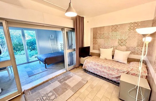 Villaggio Taunus Villa | Delightful cottage with garden and terrace overlooking the sea