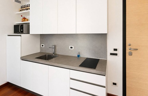 Langhe and Roero Apartment | Elegant apartment with a garage, two bedrooms, two bathrooms, and two terraces