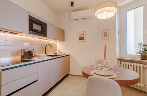 Lingotto Apartment | Elegant studio apartment in a very convenient location, right in front of the metro station: in just 6 minutes you'll be downtown, and even faster to the lively San Salvario neighborhood. The apartment is just steps from the Po River Park, the Lingotto e