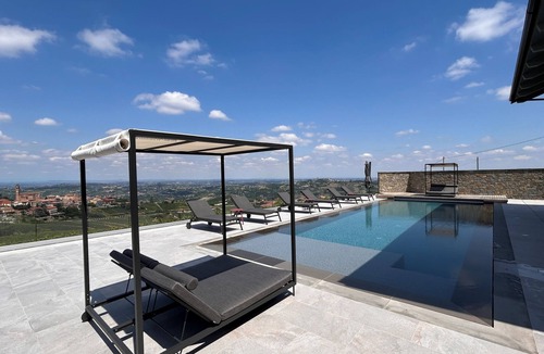 Castiglione Tinella Villa | Exclusive Elegant Villa among Piedmontese Vineyards with Heated Pool