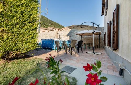 Gubbio Apartment | GuestHost - Borgo Santa Lucia Apartment with Private Parking & Garden