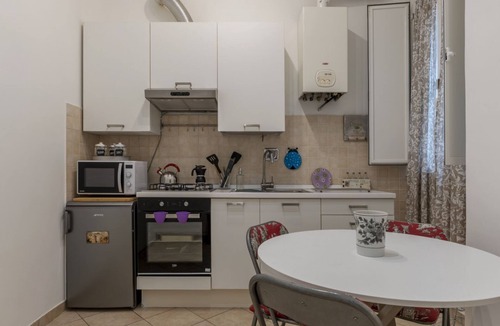 Salario Apartment | GuestHost - This spacious 55sqm apartment with four bedrooms is able to accommodate up to 8 people. Located on the first floor (with elevator not suitable for disabled) of a restored period building, the apartment overlooks the private park of Villa Alba