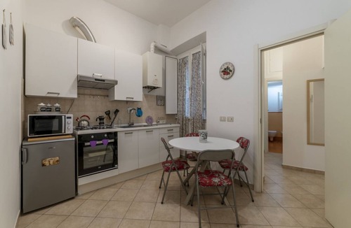 Salario Apartment | GuestHost - This spacious 55sqm apartment with four bedrooms is able to accommodate up to 8 people. Located on the first floor (with elevator not suitable for disabled) of a restored period building, the apartment overlooks the private park of Villa Alba