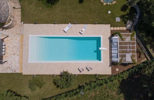 Gioia del Colle Villa | HelloAPULIA - Design Trulli Sampaolo with private pool - heated on request - Pet Friendly