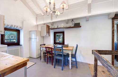 Montecrestese House | Holiday Apartment in a Historic Residence with Covered Terrace and Private Square