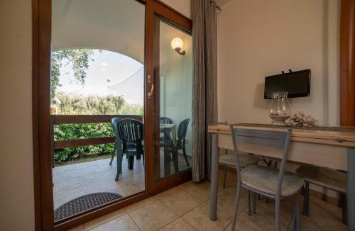 Mattinata House | Holiday Apartment orchidea with swimming pool and private beach