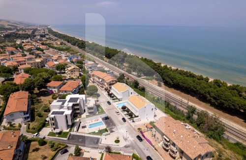 Foggetta Apartment | Holiday home ELEA is the 2025 novelty that will give you a holiday in Pineto but with the charm of a new modern construction, fresh and designed with all the comforts. The Talìa apartment has a large living room with kitchenette and sofa bed at the entr