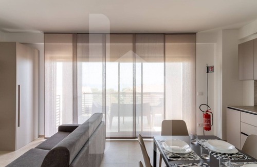 Foggetta Apartment | Holiday home ELEA is the 2025 novelty that will give you a holiday in Pineto but with the charm of a new modern construction, fresh and designed with all the comforts. he Clio apartment has a large living room with kitchenette and sofa bed at the entranc