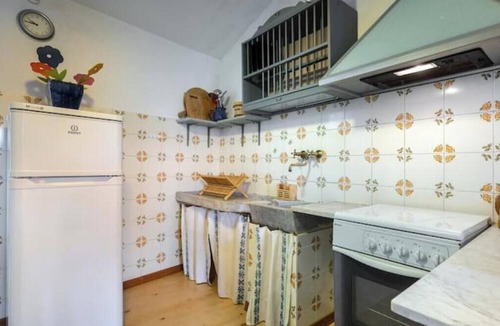 Garlenda House | Hostdomus - Olive & Garden 2