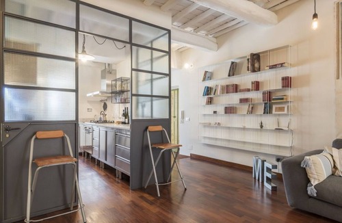 Rione III Colonna Apartment | Industrial Chic Loft Apartment in Historical Building