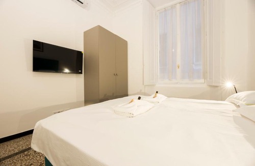 Pre Apartment | JOIVY Spacious 5-Bedroom Flat with Balcony in Central Genoa