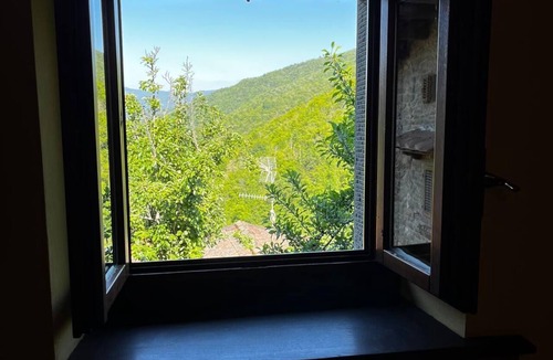 Ortignano Raggiolo Apartment | La Peglia Vacation Home: Where relaxation, nature, and forests take center stage.