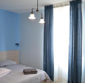 Maratea House | La stanza dell'angolo