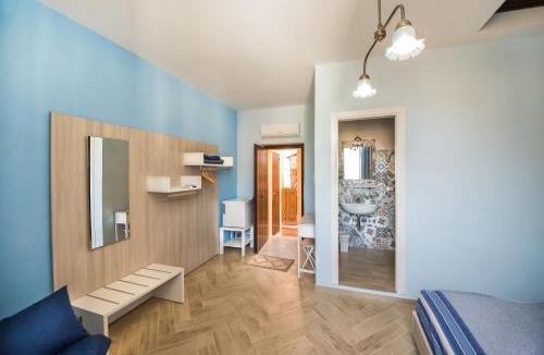 Maratea House | La stanza dell'angolo
