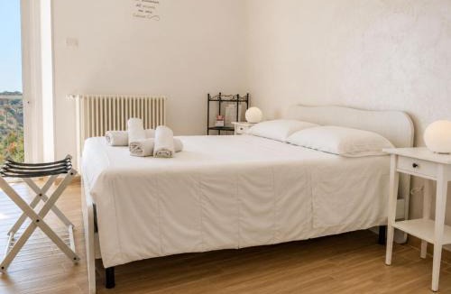 Grottole House | La vista sulle grotte