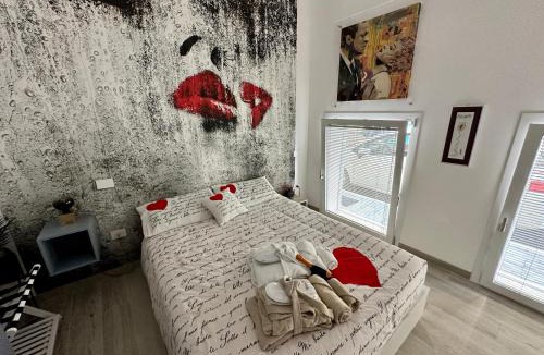 San Benedetto del Tronto Apartment | Love Suite Gallery Appartamento con Sauna - Bed Art Relaxing Suite