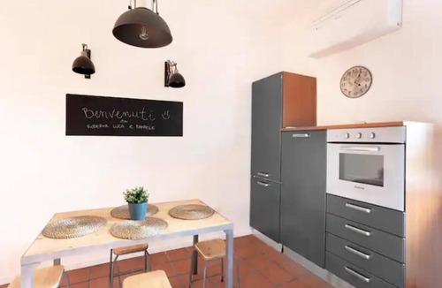 Ancona Condo | Lovely apartment with fireplace station area