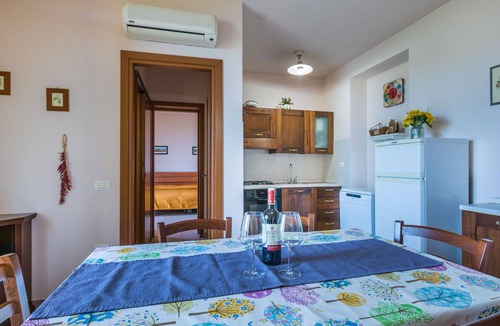 Castellina Marittima Apartment | Nice apartment for 7 guests with A/C, WIFI, pool, TV, patio, pets allowed and panoramic view