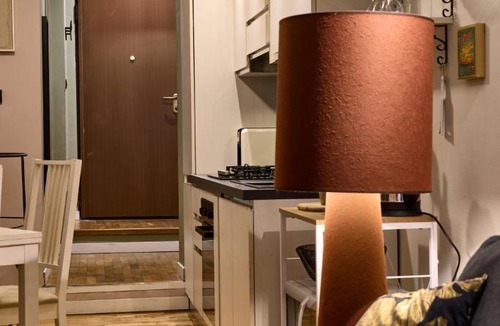 Roman Quarter Apartment | Nicma, a small candy box in the center