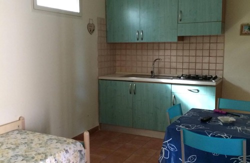 Defensola House | Orchid holiday flat with covered veranda