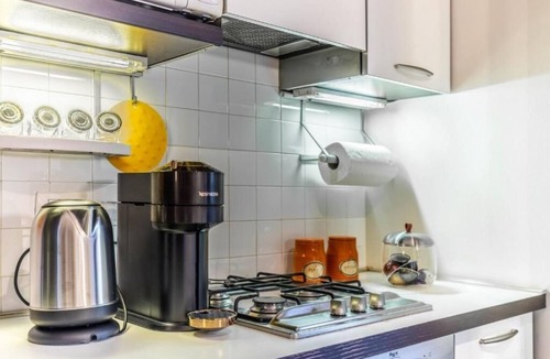 Ticinese Apartment | Prada House: Modern Comfort with Terrace and Parking in Milan