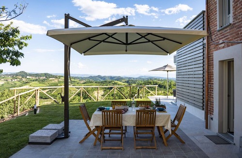 Montaldo Roero Villa | Private Villa with A/C, hot tub, WIFI, sauna, private pool, TV, patio, panoramic view, close to Alba