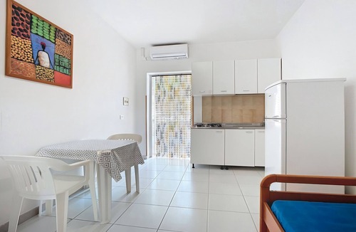 Chiesiola Resort | Property in a holiday village 'Baia Falcone - Standard 305' with sea view and air conditioning