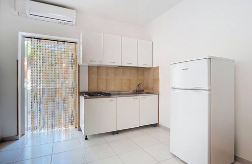 Chiesiola Resort | Property in the holiday village 'Baia Falcone - Standard 306' with sea view and air conditioning