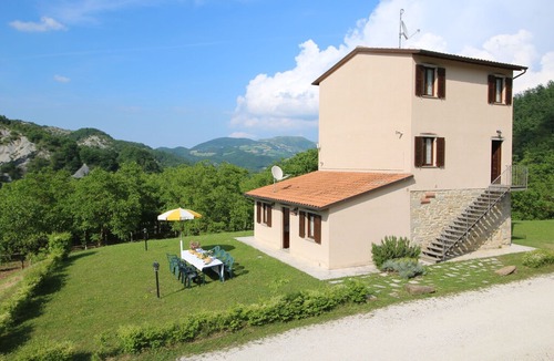 Apecchio Villa | Property with swimming pool, spacious garden, private terrace and views