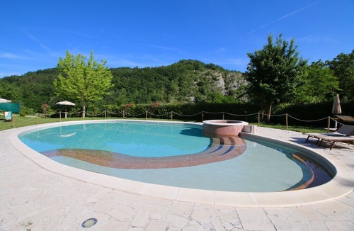Apecchio Villa | Property with swimming pool, spacious garden, private terrace and views