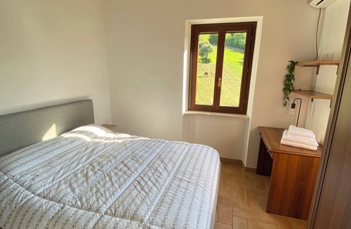 Cingoli House | Relax in our Bed & Breakfast between horses and olive trees.