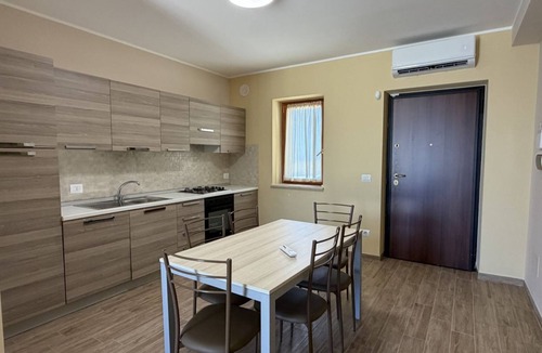 Bonifati Apartment | Sea-view apartment with a pool