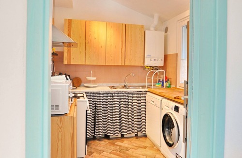 Quercianella Apartment | Stunning panoramic view of the sea, private garden, air conditioning.